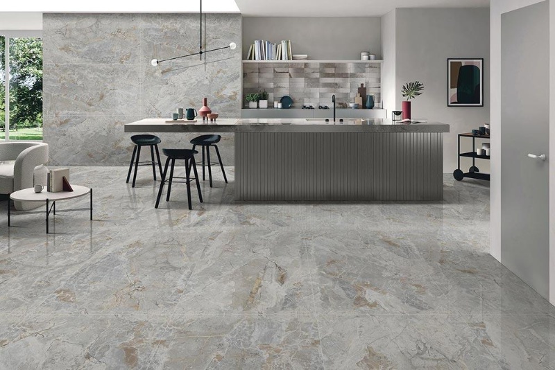 Large-format vitrified floor tiles in a modern kitchen.